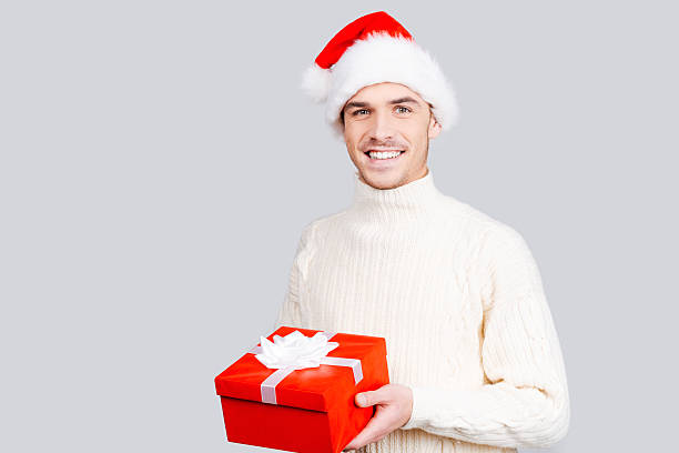 Free Stock Photo of Young guy in a sweater and a Santa hat | Download ...