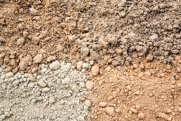 Four color soil background Natural silty soil background: brown, gray and red. silt stock pictures, royalty-free photos & images