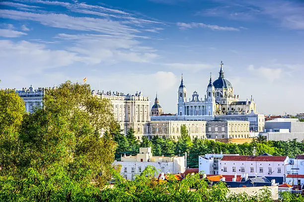 Madrid, Spain skyline at Santa Maria la Real de La Almudena Cathedral and the Royal Palace.
