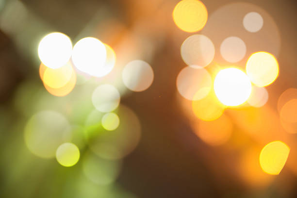 istock Abstract dark background with colorful bright bokeh 527190983