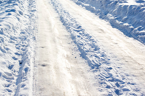 istock Winter trail, the road in the snow 527211084