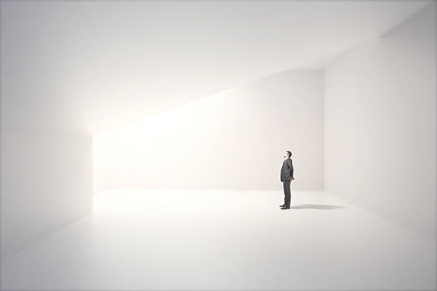 istock Concrete room with businessman 527211164