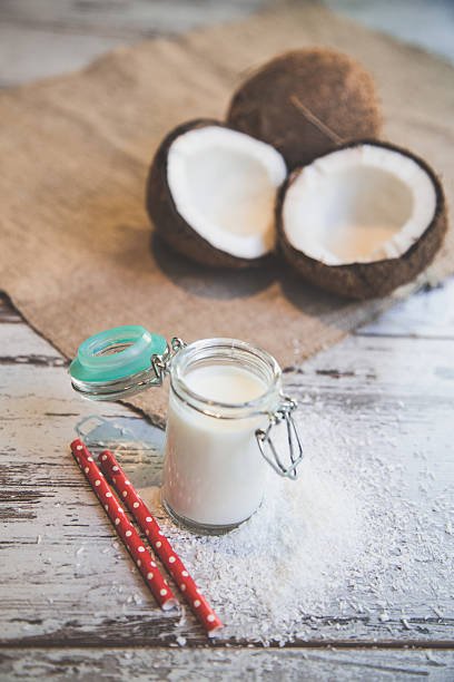 istock Coconut vegan milk non dairy in different bottles 527211964