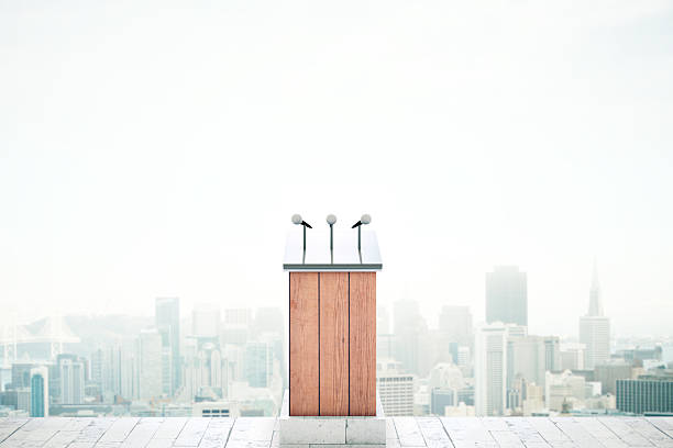 istock Tribune on city background 527212326