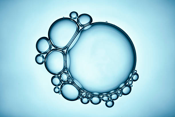 istock Blue Soap Bubbles 8 - Water Abstract Macro Foam Background 527212608