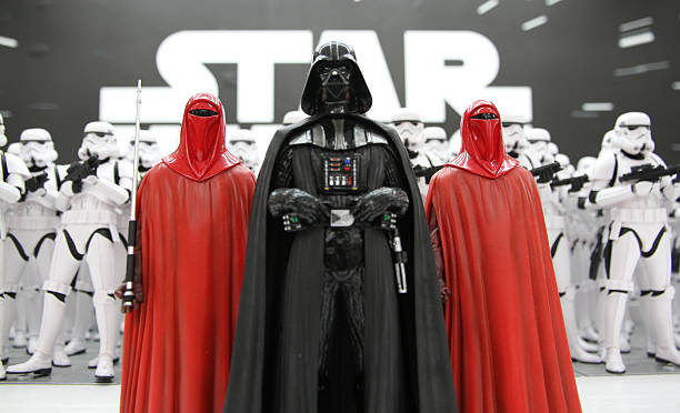 Star Wars Tokyo, Japan - April 14, 2016: Toy Stormtroopers lined up in ranks led by Darth Vader and Imperial Guards. The action figures are created by the Kotobukiya Toy company and are from the Star Wars media franchise.  action figure photos stock pictures, royalty-free photos & images