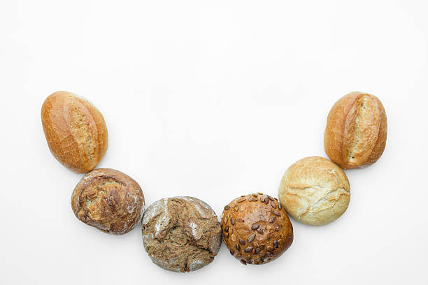 istock German traditional breads aligned on a curve white isolated back 527214374