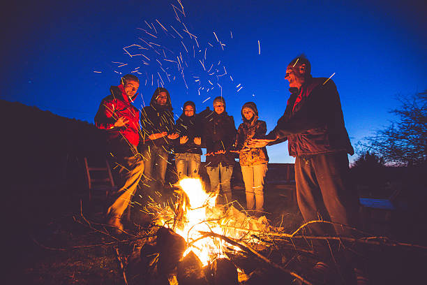 istock Friends near campfire 527219124