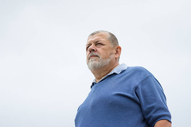 istock Bearded senior man looking with hope 527222480