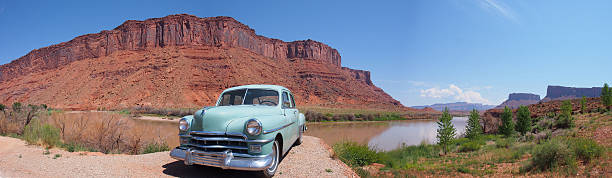 istock Old car in desert panorama 527223306