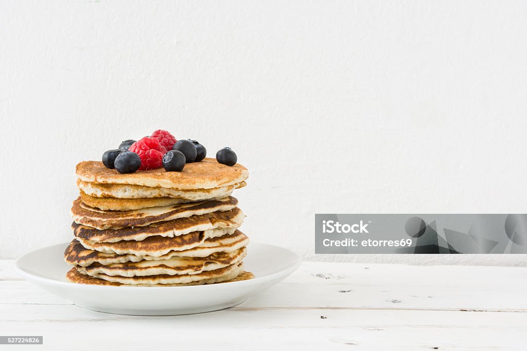 American breakfast. Pancakes American breakfast. Pancakes with raspberries and blueberries Pancake Stock Photo