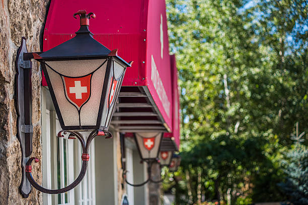 Sigh Street (Calle de los suspiros). Colonial style details: signposting and lantern. Colonia del Sacramento, Uruguay