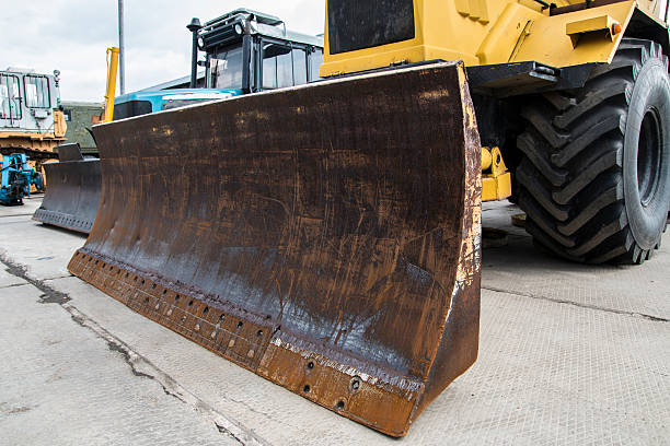 istock Bulldozer standing on road construction - industrial concept 527228758