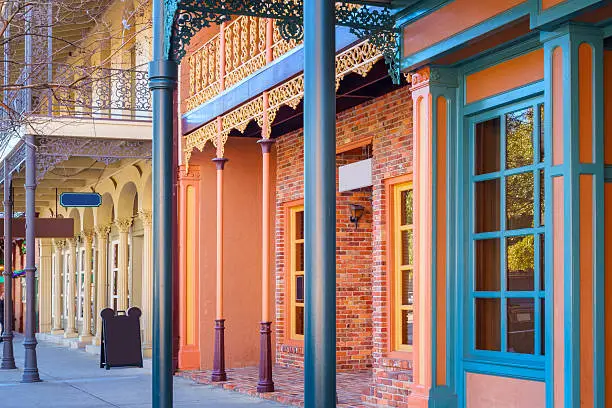 Photo of Colorful Architecture and Facades with Ornate Wrought Iron Balconies, Pillars and Decorations in Downtown Pensacola, Florida, USA.