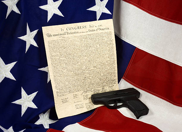 istock Declaration of Independence with Hand Gun, Horizontal 527232822