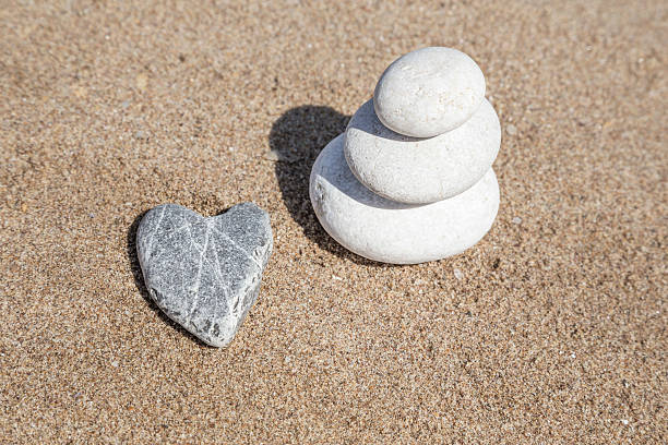 istock stack of pebble stones on balance on beach 527233156