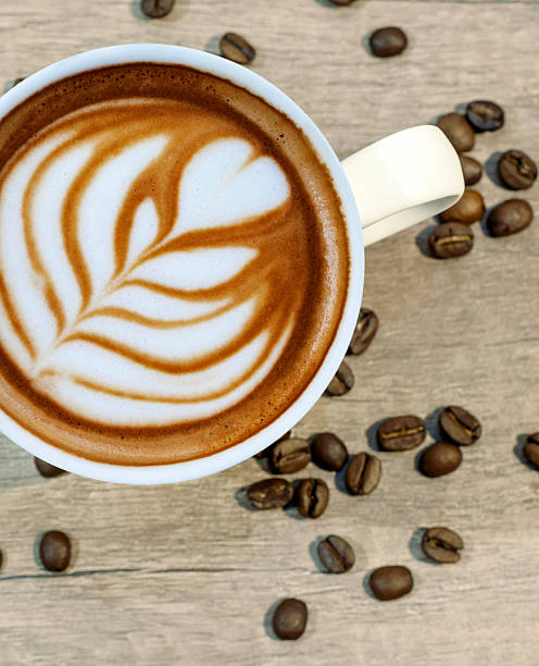 istock Cup of hot espresso coffee drink with coffee beam 527234380