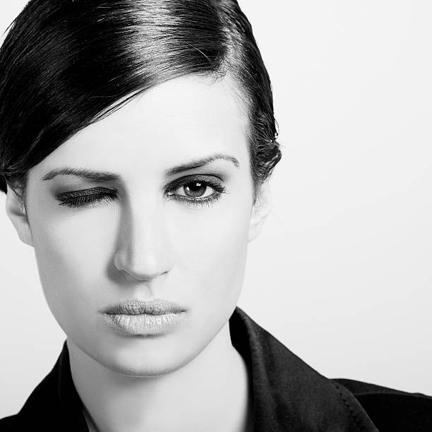 istock Woman with intense look on white background 527236885