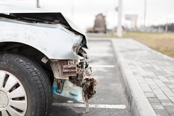 istock broken car after the accident in  foreground 527237742