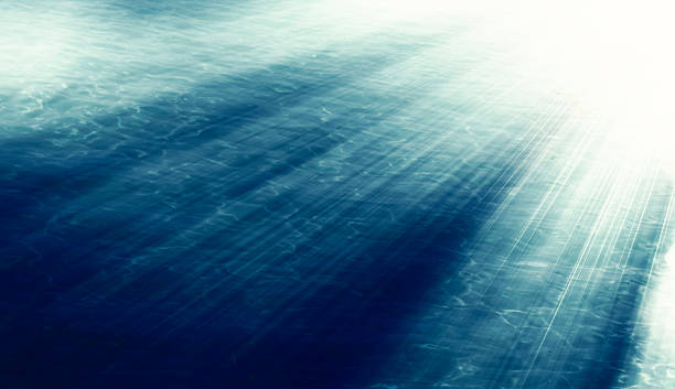 istock Sunburst rays over moody sea 527239029