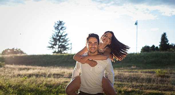 istock Smiling couple having fun in the park. 527241134