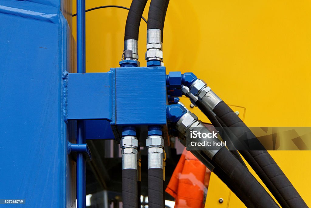 hydraulic tubes hydraulic tubes, part of a machine Hose Stock Photo