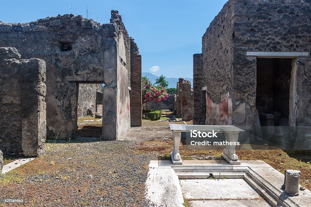 Ruins of ancient city Pompeii Ruins of ancient city Pompeii, destroyed by vulcanic eruption of Vesuvio mountain, Italy Accidents and Disasters Stock Photo