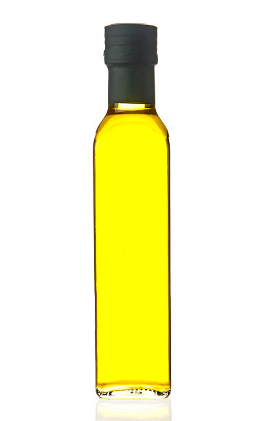 istock Olive oil bottle closeup 527270369