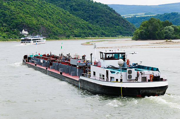 istock Barge and cruise ship on Rhine River 527270807