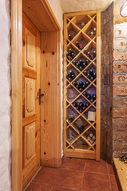 istock Shelf with wine bottles in home 527273509