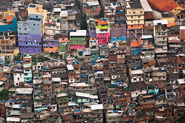 Biggest Slum in South America, Rocinha, Rio de Janeiro, Brazil Favela da Rocinha, the Biggest Slum (Shanty Town) in Latin America. Located in Rio de Janeiro, Brazil, it has more than 70,000 inhabitants. imbalance photos stock pictures, royalty-free photos & images