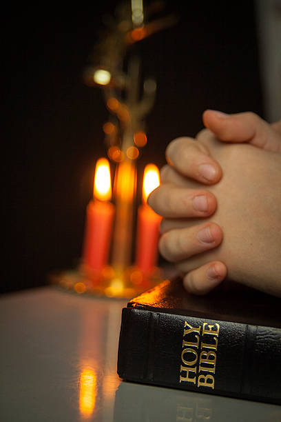 istock Holy Bible and Candles 527314813