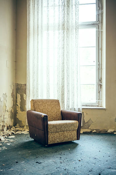 istock old chair by the window 527316829