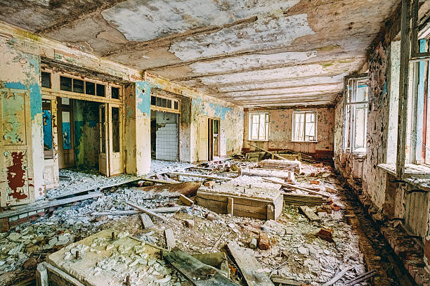 istock Dilapidated passage in school of Pripyat. Chernobyl Disaster 527317201