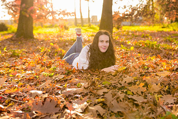 istock Woman portret in autumn leaf 527344257