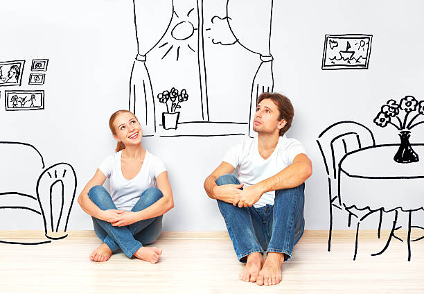 istock happy couple in  new apartment dream and plan interior 527345607