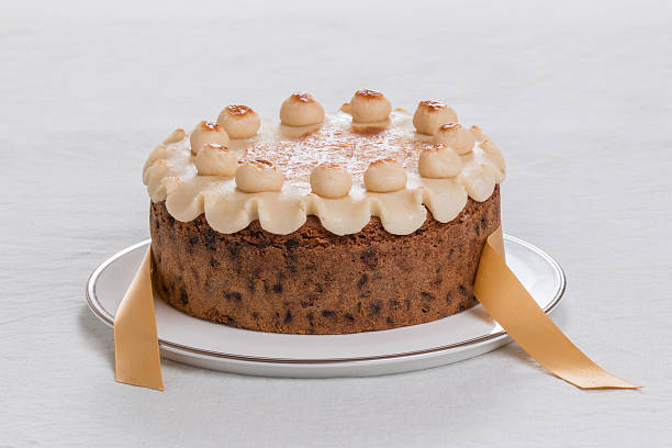 istock Simnel cake on a plate with marzipan on the top, 527346331