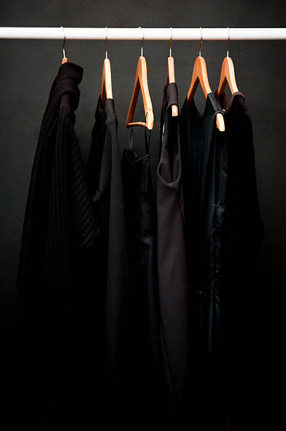 hangers, black clothes (click for more) - clothing closet hanger dress stock-fotos und bilder