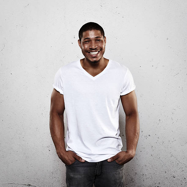 istock Smiling young man in white t-shirt 527348467