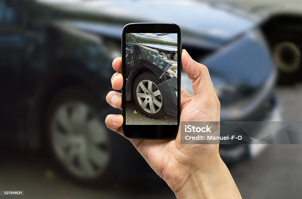 photo for accident insurance Man photographing his veiculo damages for accident insurance Car Stock Photo