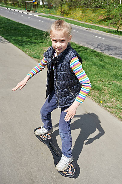 istock Girl riding a skateboard 527369833