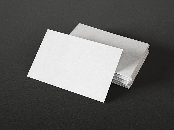 istock Gray business cards on dark background 527369853