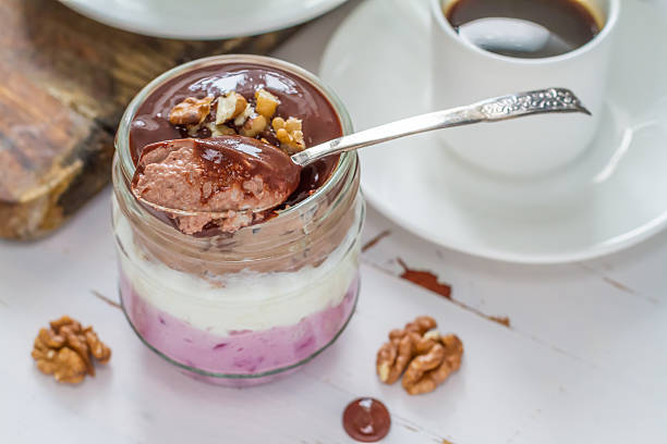 istock Layered jelly with chocolate cream and walnuts 527369995