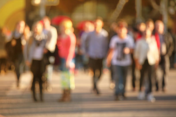 istock Group of people on a street, defocused background 527371309