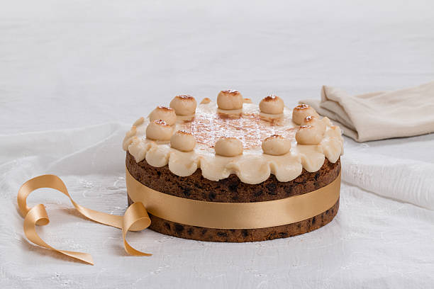 istock Simnel cake   with marzipan on the top, 527371425