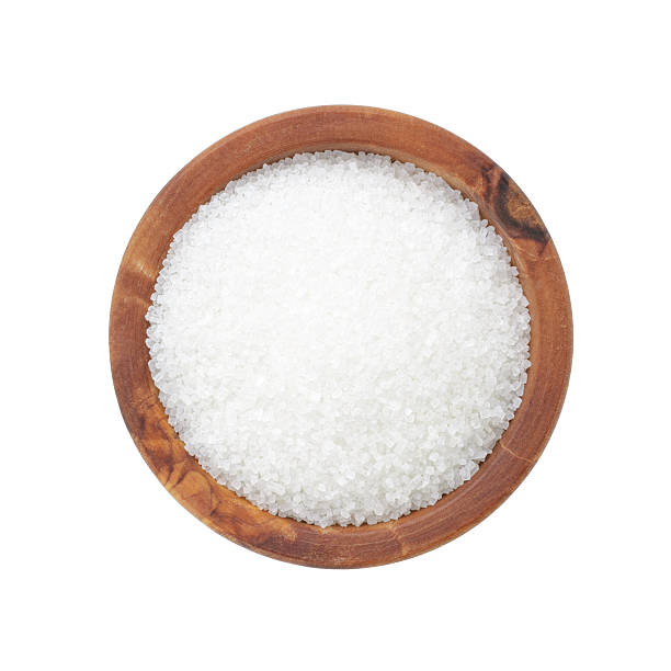 istock sugar in wooden bowl for cooking or spa 527371675
