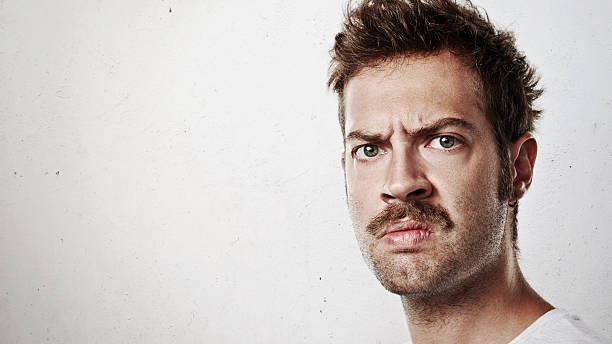 istock Portrait of an angry man with mustache 527372223