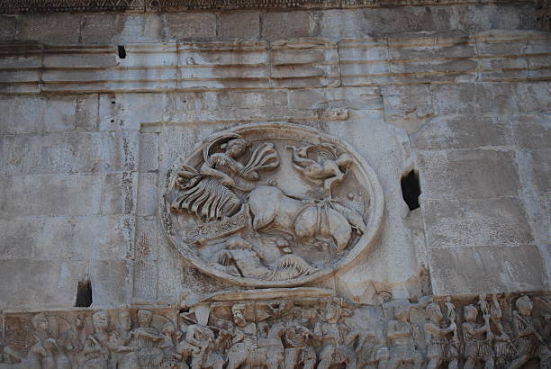 istock Arch of Constantine in Rome next Coliseum 527373025