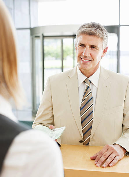 istock Confident business woman with colleagues 527373243