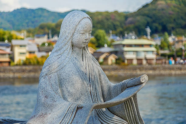 Murasaki Shikibu statue Kyoto, Japan - October 21 2014: Murasaki Shikibu statue, A Japanese novelist, poet and lady-in-waiting at the Imperial court during the Heian period, best known as the author of The Tale of Genji heian period stock pictures, royalty-free photos & images